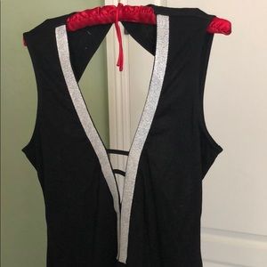 Mini black dress with open back and sides